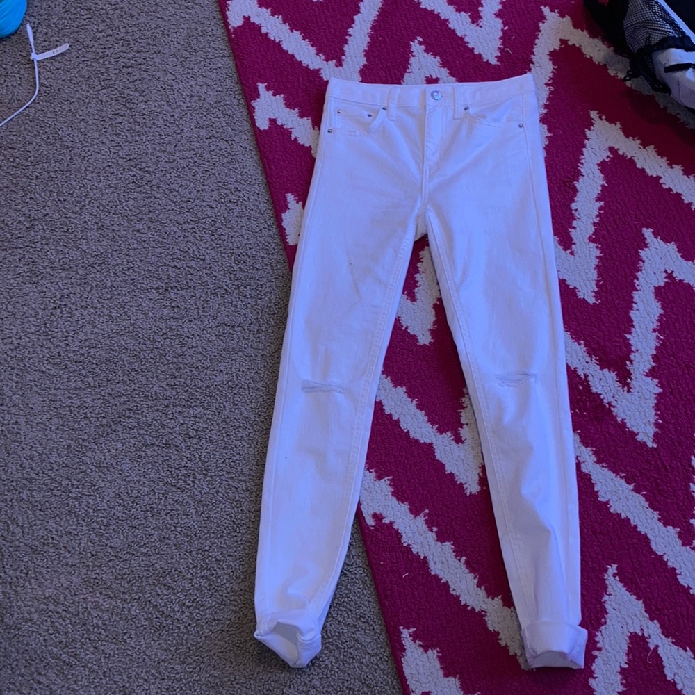 Ripped white target jeans